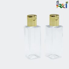 Gold flip cap bottle